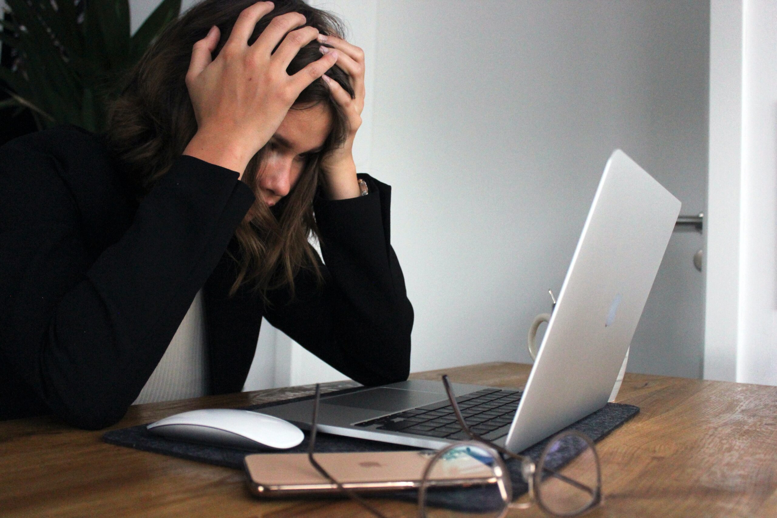 Stressed Woman looking at computer
